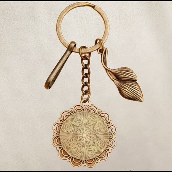 3/$25❗️Bronze Flower Glass keychain - Picture 2 of 2